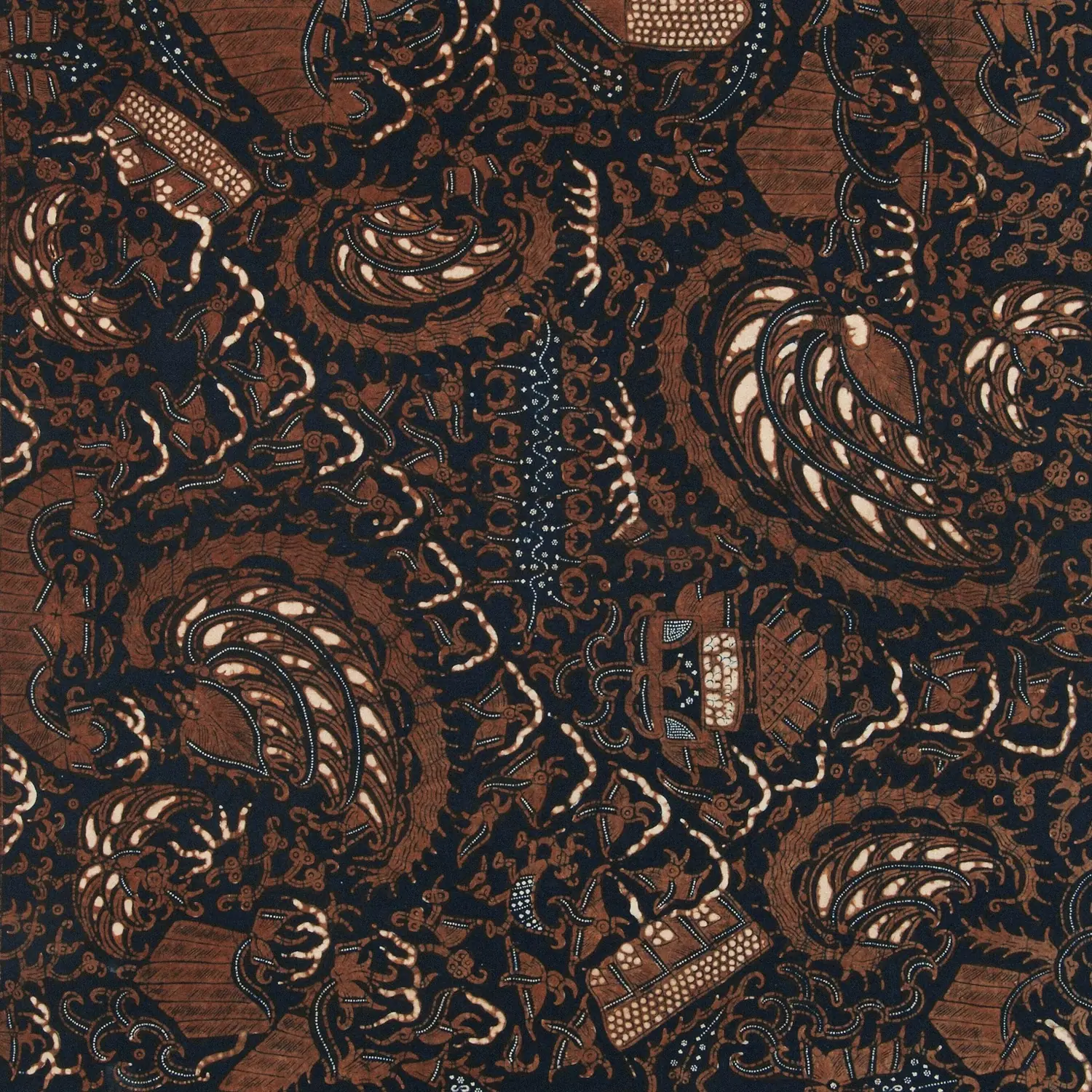 Close view of hand-drawn batik in brown and indigo