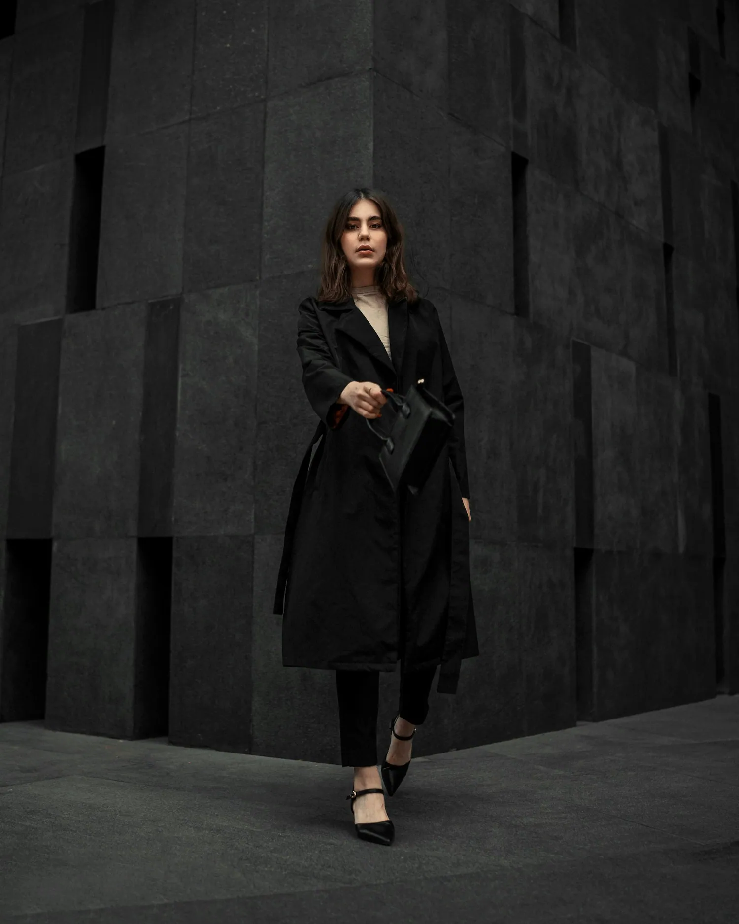 A tailored coat in black
